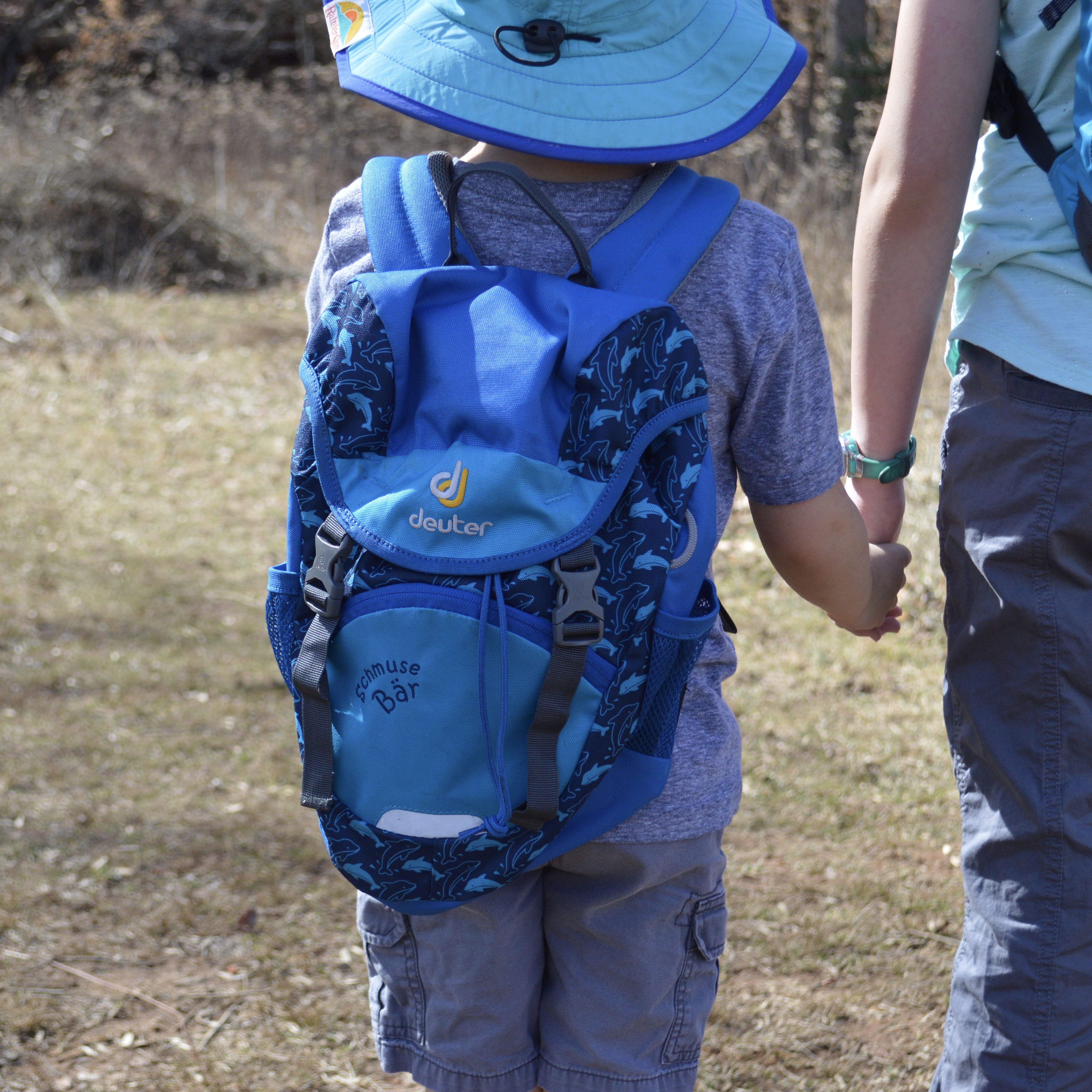 Wondering about hiking packs for kids and adults wearing kids? When we first started hiking, I wasn’t sure if hiking-specific backpacks were worth it. Go to ouradventuringfamily.com to read what we decided to do.