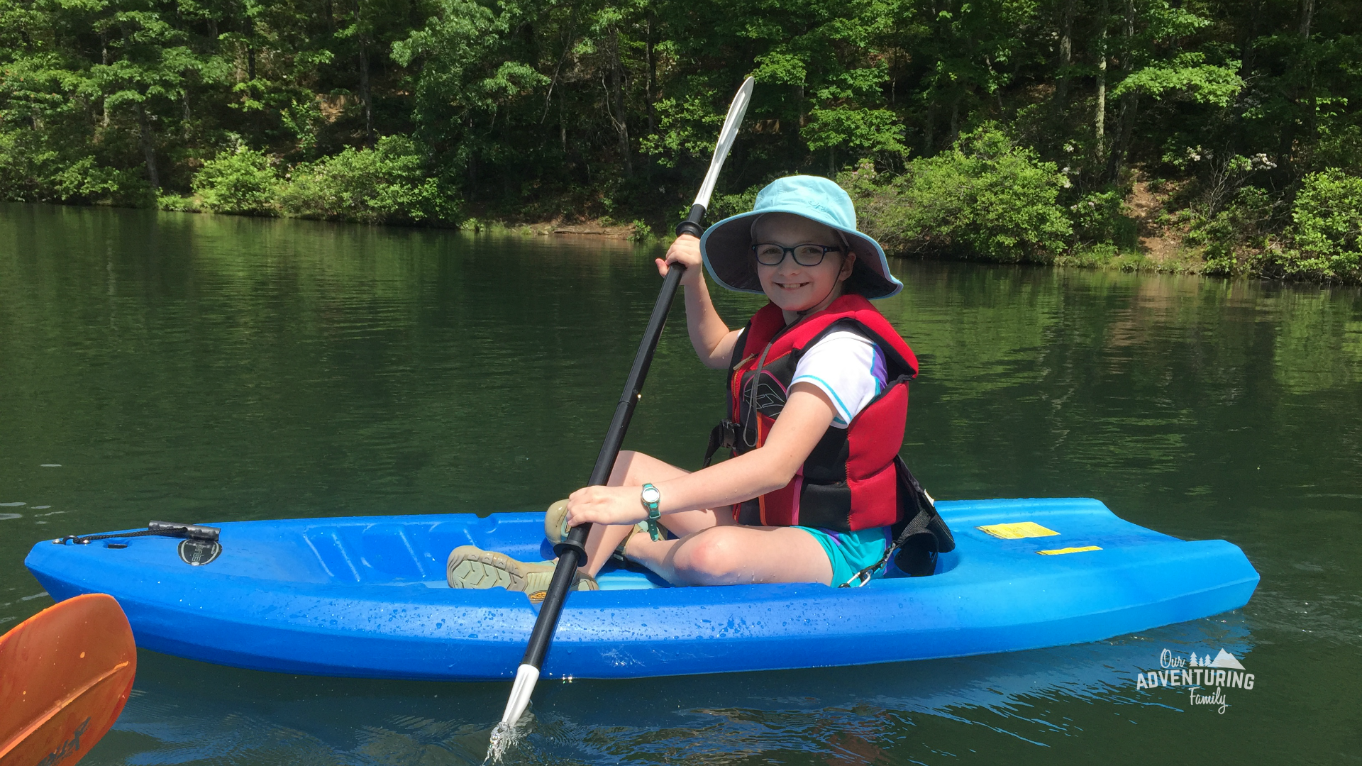 8 steps to kayaking with kids. Preteens love the independence of paddling their own kayak. Learn what you need to do to give kayaking as a solo parent a try at ouradventuringfamily.com.