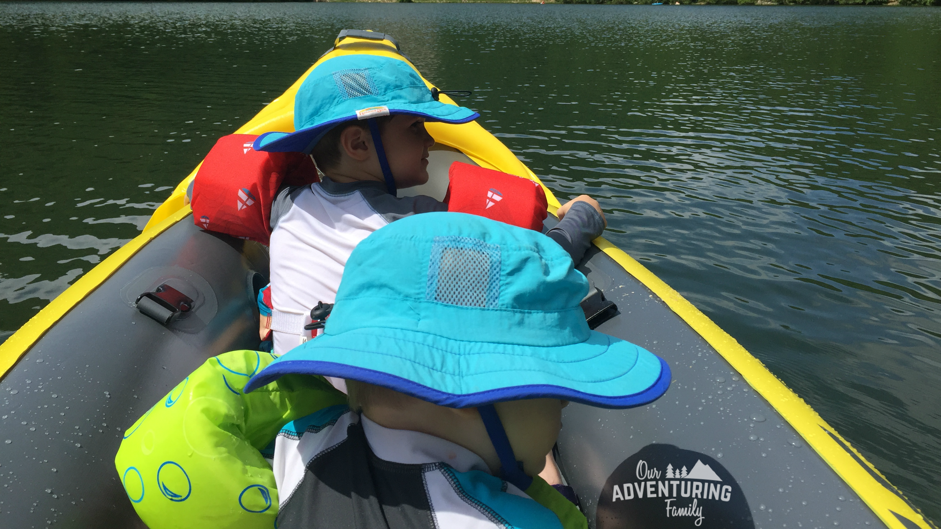 8 steps to kayaking with kids. Toddlers may be impulsive, but you can still take them kayaking by yourself. Learn what you need to do to give it a try at ouradventuringfamily.com.