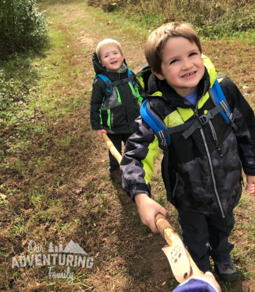 Trekking poles or a hiking staff? Which is a better fit for you? Here’s six ways a hiking staff can come in handy while you're hiking or camping. Find them at ouradventuringfamily.com.