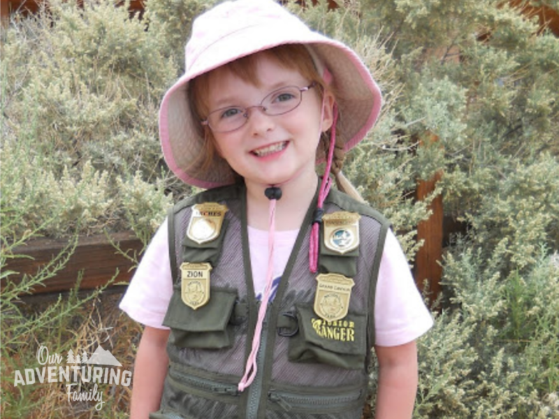 Online Junior Ranger programs can be a good way to learn about the national parks while social distancing this summer. Fun & learning for the whole family. Find out more at ouradventuringfamily.com.